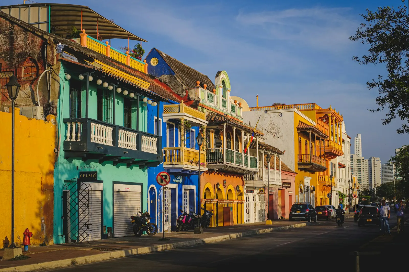 Colonial courtyard in Cartagena's walled city with colourful facades and bougainvillea
